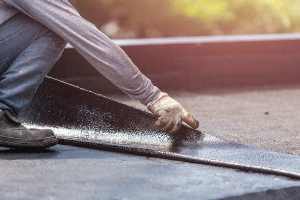 Professional Waterproofing technician working in East Norwich, NY